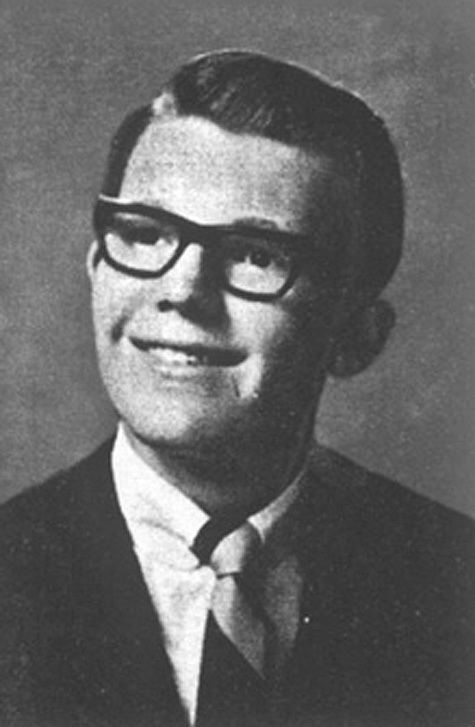 Steven Earl Parent wearing eyeglasses and a suit with a tie.