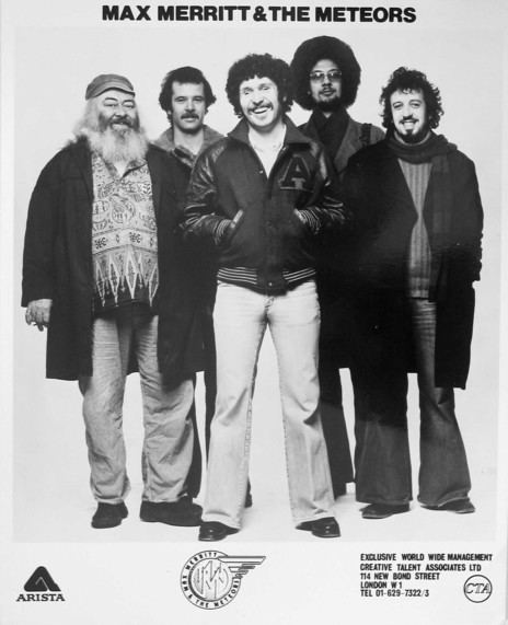 Stewie Speer smiling on the left in his mustache and long beard together with the Max Merritt and the Meteors band