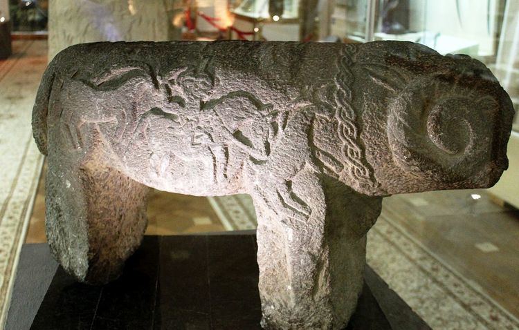 Stone sculptures of horses and sheep