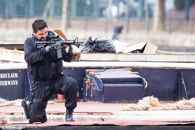 Stratton: First into Action Dominic Cooper looks the ultimate action hero in Stratton movie
