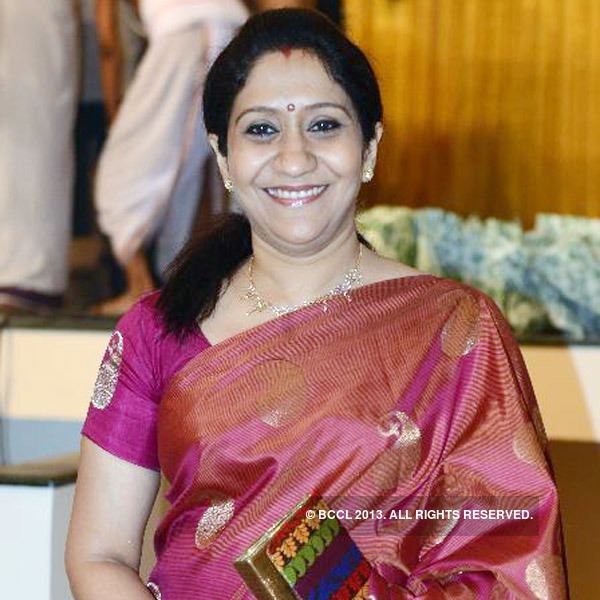 Sujatha Mohan Sujatha Mohan is all smiles at the wedding reception of