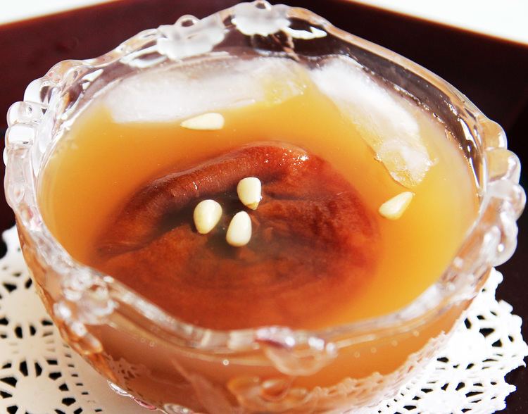 Sujeonggwa Dessert punch with persimmon cinnamon and ginger Sujeonggwa