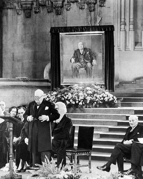 Winston Churchill giving a speech on his 80th birthday at Westminster Hall while his portrait is on display