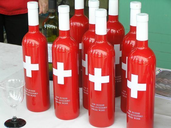 Swiss wine Patriotic Swiss wine bottles dressed in the country39s flag Grezi