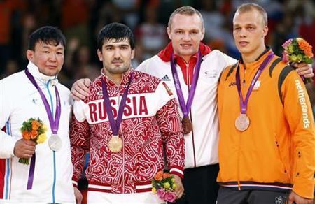 Tagir Khaybulaev Putin celebrates as Khaibulaev wins gold Reuters