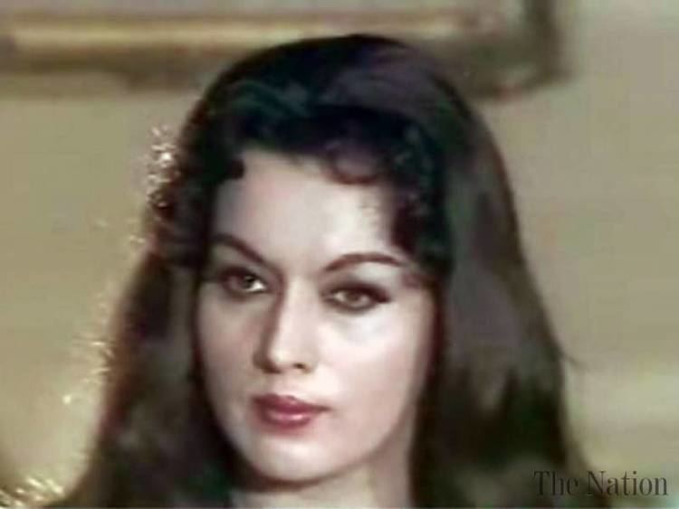 Tahira Wasti with a fierce look and wavy hair.