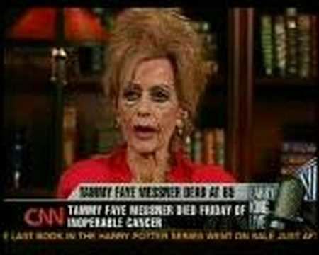 Tammy Faye Messner on a news while wearing a red blouse