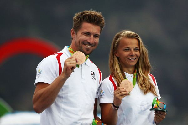 Thomas Zajac and Tanja Frank smiling while holding the bronze medal for the Nacra 17 Mixed class on Day 11 of the Rio 2016 Olympic Games