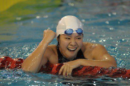 Tao Li Tao Li wins first gold medal at swimming world cup