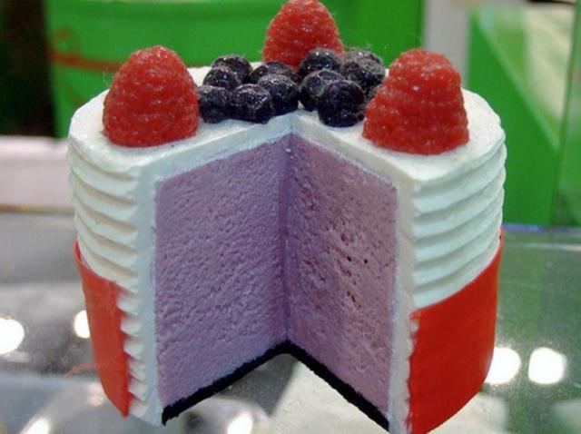 Taro cake cake with white cream amp fresh blueberries amp rasberries