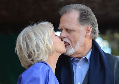 Taylor Hackford English actress Helen Mirren kisses her husband director