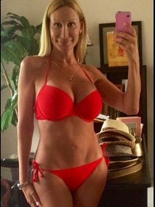 Taylor Lianne Chandler smiling and wearing red bikini