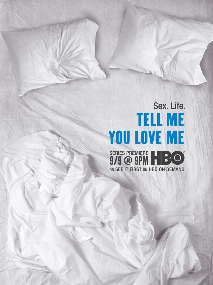 A poster advertising the Tell Me You Love Me television drama series by HBO and featuring a bed with white pillows and white sheets.
