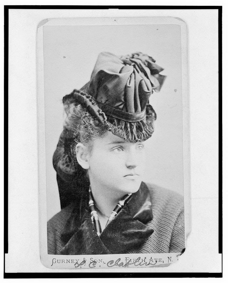 Tennessee Celeste Claflin Tennessee Celeste Claflin 18461923 Full seated with group of