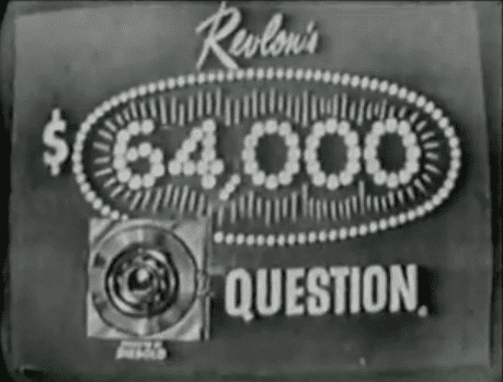 The $64,000 Question is an American game show broadcast, it has the word “Revlon’s” on top, the 64,000 is encircled, it has lines around, and the $ sign is outside the circle, below (left) is a circle and on right is the word “QUESTION”