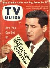Hal March is serious, left eye closed, has black hair, both hands holding a card of “The $64,000 Question”, above is “Why Frankie Laine Got Big Break On TV”, on the middle left is TV GUIDE, and on the bottom left is “How You Can Get On…” he is wearing white long sleeves and brown necktie under a black suit.