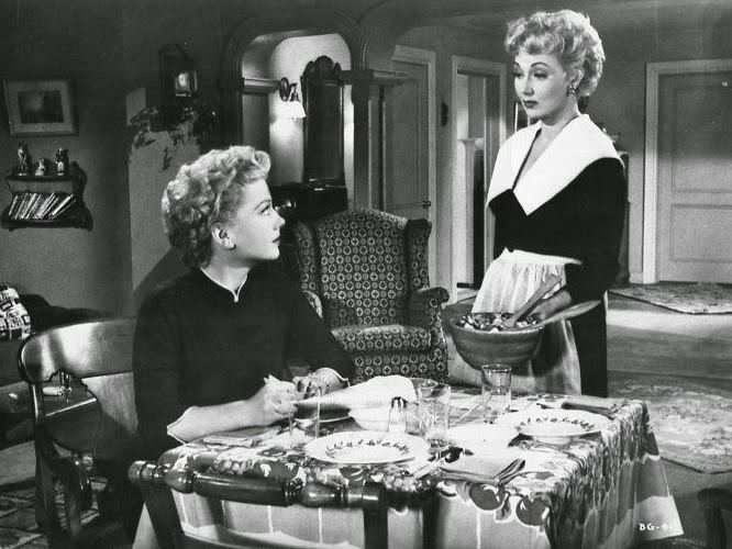 The Blue Gardenia (1953 film) movie scenes Unfortunately her beau is half a world away serving in the military But that doesn t keep her from preparing a candle lit dinner 