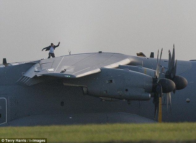 The Booze Hangs High movie scenes Tom Cruise filming scenes for new movie Mission Impossible 5 at RAF Wittering in