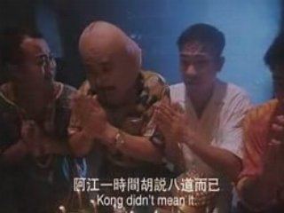 People Praying in a scene from The Eternal Evil of Asia, 1995