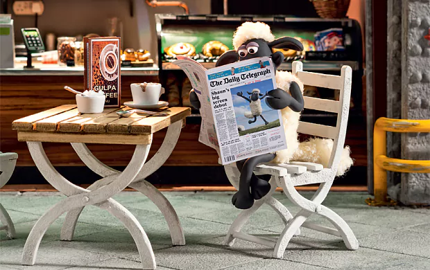 The Little Lost Sheep movie scenes Shaun the Sheep reclining with his favourite newspaper 