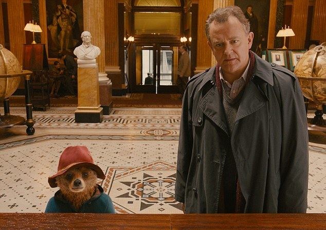 The Million Dollar Cat movie scenes Duffel kerfuffle Paddington Bear with Mr Brown played by Hugh Bonneville in the upcoming