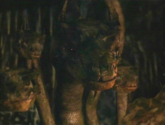 The Snake King movie scenes No Snakeman in this movie A giant Multi headed snake they call the Naga which is a mythical snake creature but this looks more like a Hydra 