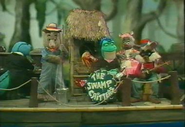 The Swamp Critters of Lost Lagoon casts- Big Al Gator, Billy Bob Possum, Gumbo Fiddler Crab, Ribbit E. Lee, Ima Dilla, and Joe Raccoon (from left to right)