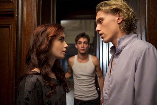 The Triangle (film) movie scenes THE LOVE One particular scene that I need to call out happens right after the epic greenhouse kissing scene where Simon catches Jace and Clary 