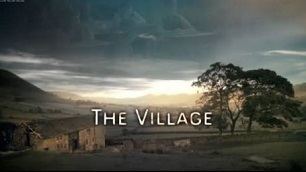 The series title over a view of the village