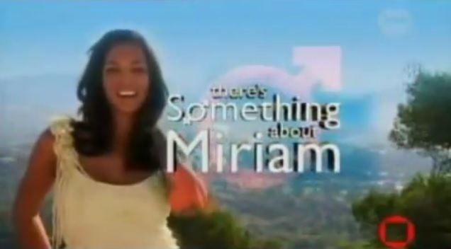 Poster of "There's Something About Miriam", a 2003 reality television show featuring Mirian Rivera smiling while holding her wavy black hair and wearing a yellow sleeveless top.