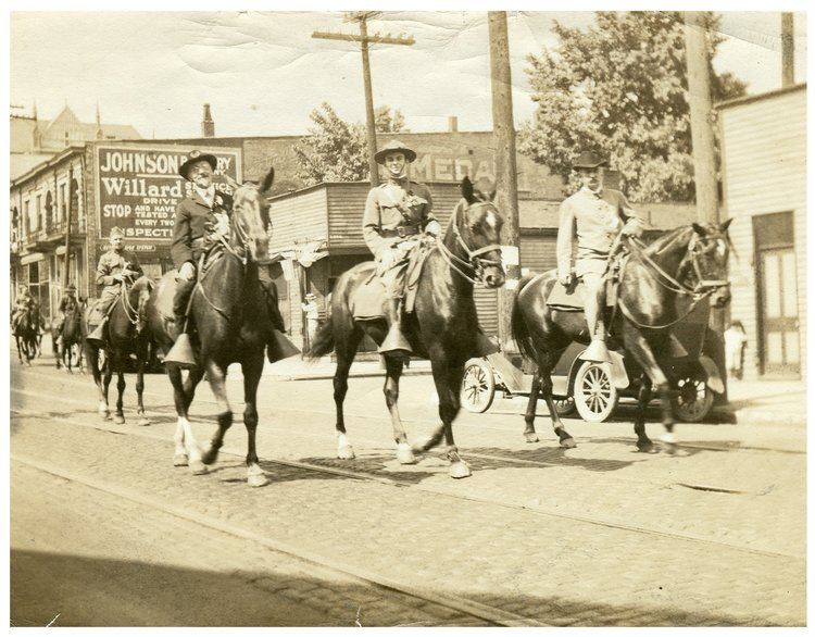 Three mounted men in a Memorial Day Parade handwritten in ink on