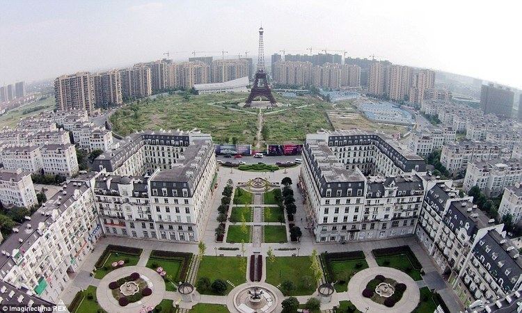 Tianducheng Chinese town creates vegetable garden below Eiffel Tower replica