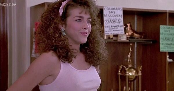 Tina Caspary while smiling in a scene from the 1987 movie, Can't Buy Me Love