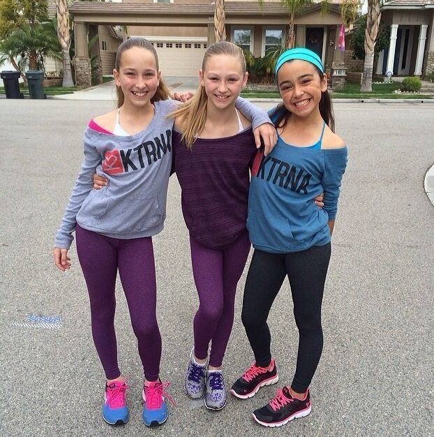 Autumn Miller smiling with her friends