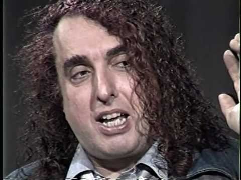 Tiny Tim with curly hair.