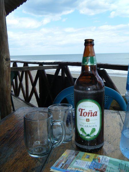 Toña (beer) Coast to Coast 13a Tona beer next to the Pacific Ocean Photo