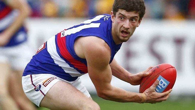 Tom Liberatore Dustin Martin Tom Liberatore and tagger Ryan Crowley make