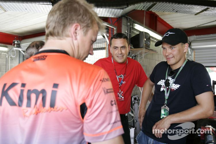Toni Vilander Kimi Raikkonen talks with Paolo Coloni and Toni Vilander