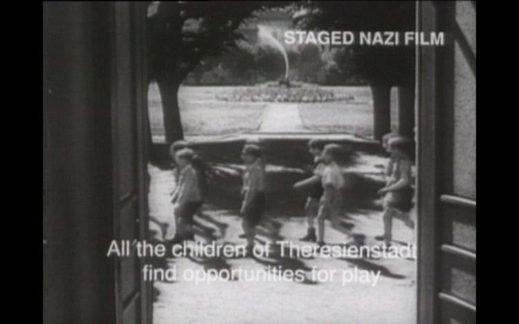 Tracks to Terezin movie scenes A scene from the Nazi propaganda film The Fuhrer Gives the Jews a City staged inside the Theresienstadt camp ghetto This scene depicts the allegedly 
