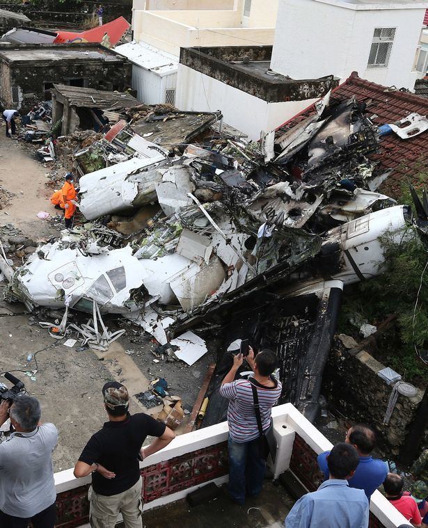 TransAsia Airways Flight 222 Dramatic pictures show wreckage of Taiwan plane crash that killed 48