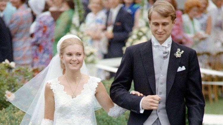 Tricia Nixon smiling with Edward Cox after they exchanged wedding vows in a White House rose garden ceremony
