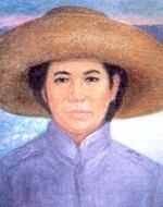 Portrait of Trinidad Tecson with a serious face while wearing a buri hat and blue blouse