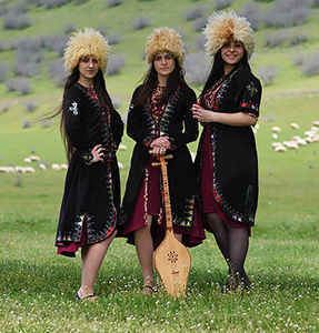 Trio Mandili wearing tribal outfit on their album With Love