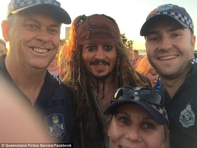 True Caribbean Pirates movie scenes Run in with the law Johnny has been posing with plenty of locals as he