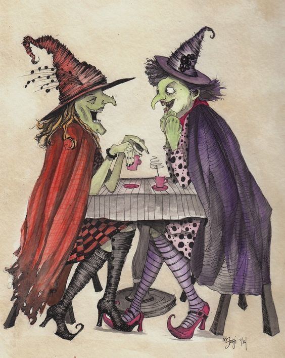Two Witches are laughing while sitting on the chair with coffee on the table. The witch on the left is wearing a red cape, red hat, black boots, and a black and red checkered dress while the witch on the right is wearing a violet hat, violet cap, a pink and black polka dot dress, pink heels and violet high socks