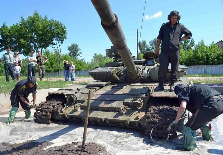 Ukrainian Ground Forces Extricating Tank from Dirt Ukrainian Ground Forces Global