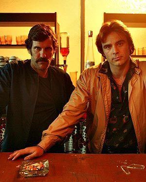 Tim McCunn and Dustin Clare with a serious face in the 2009 drama series, Underbelly: A Tale of Two Cities