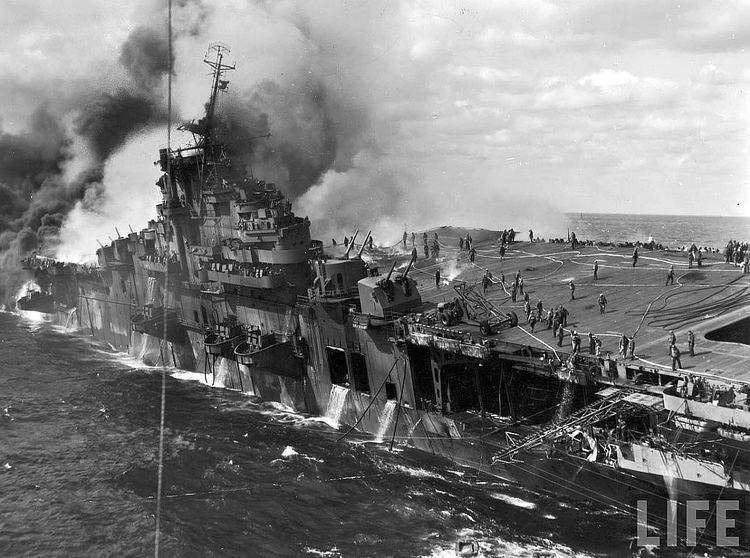 USS Franklin (CV-13) USS Franklin CV13 crew battle huge blaze after she was hit by two