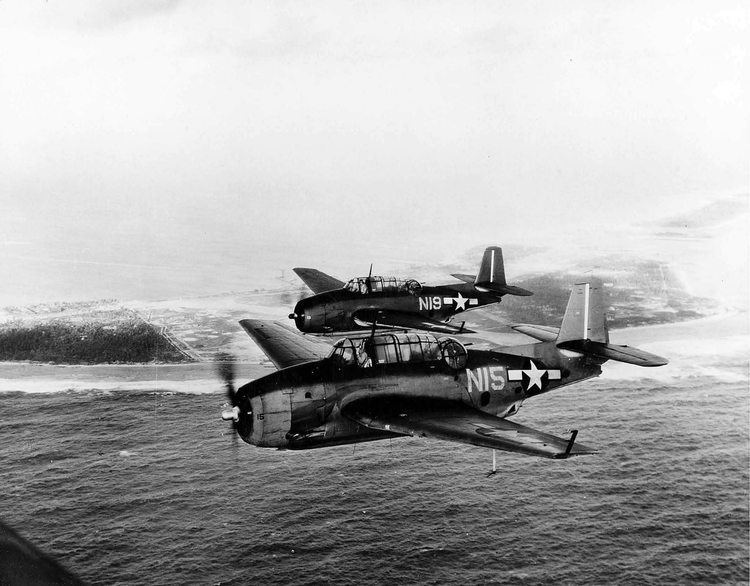 USS Natoma Bay (CVE-62) TBM Avengers N15 and N19 of Composite Squadron VC63 off the escort