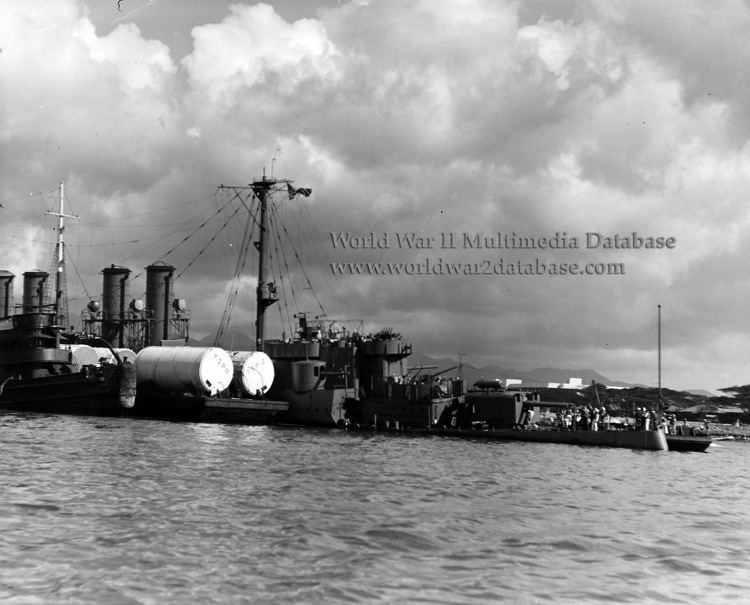 USS Raleigh (CL-7) Pontoons Are Strapped to USS Raleigh CL7 The World War II